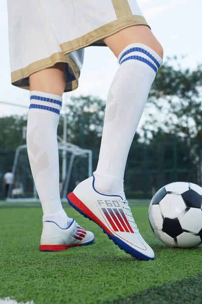 Juniors' SwiftWing Football Shoes